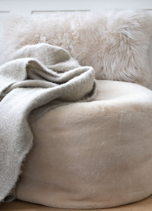 Lammfellpouf Premium | Neuseeland | Mokassin | D55x46 cm Kastanie